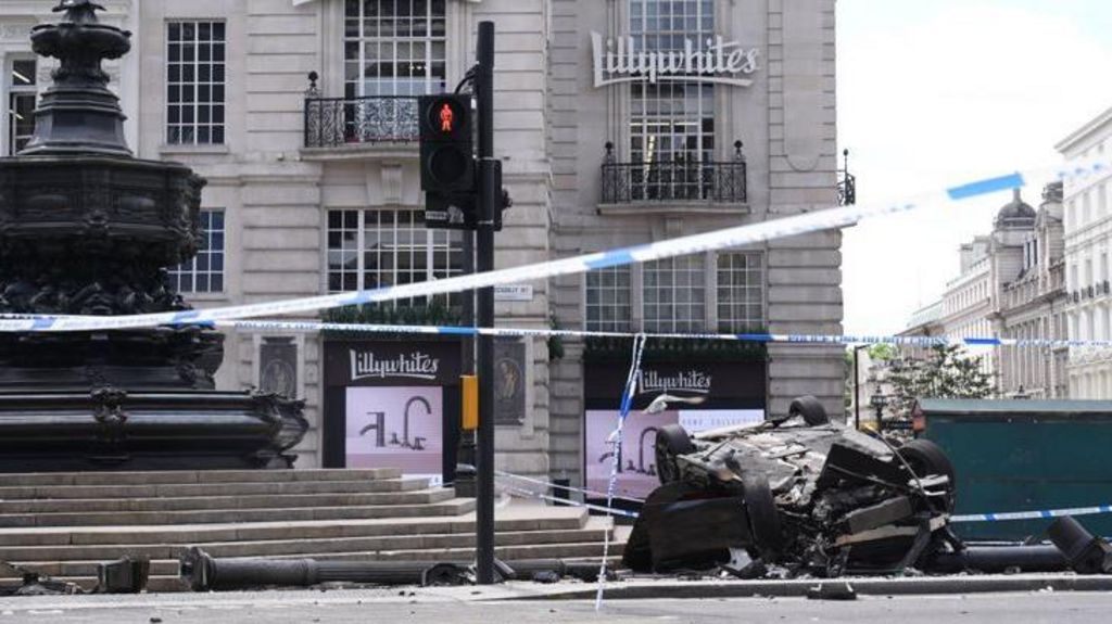 A black car crashed in Piccadilly Circus