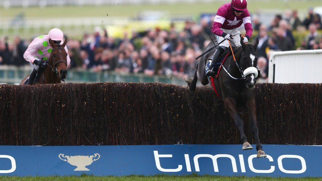 Bryan Cooper on Don Cossack clears the last from Djakadam ridden by Ruby Walsh on the way to winning the Timico Cheltenham Gold Cup Chase in 2016