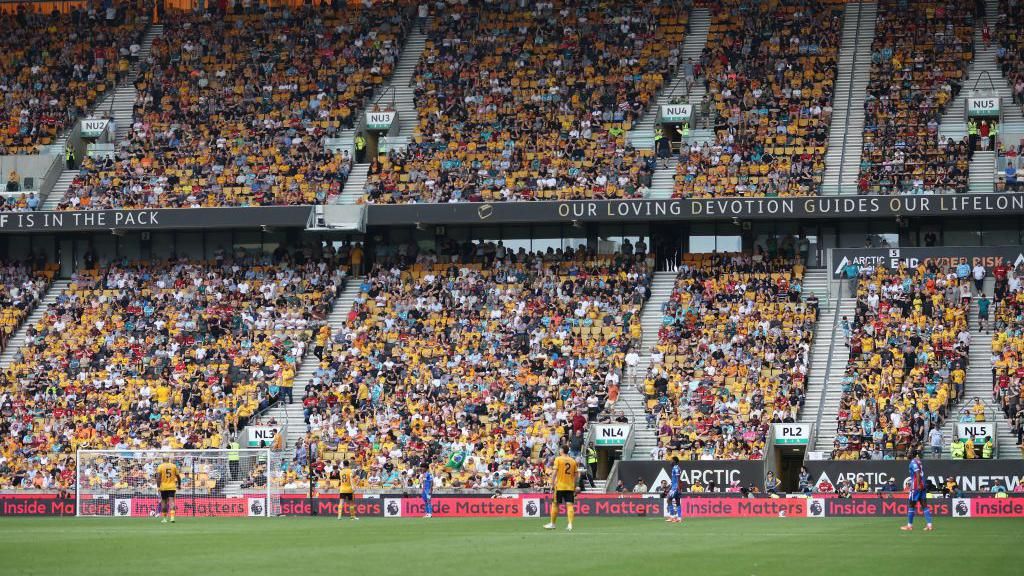 Molineux stadium with fans watching Wolves vs Crystal Palace