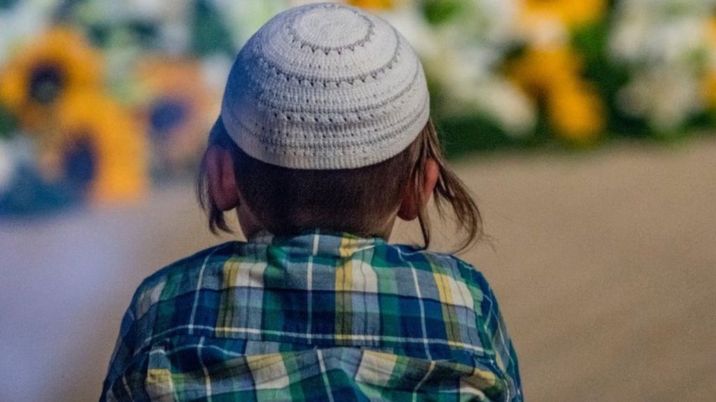 Boy wearing a Jewish skullcap, or kippa