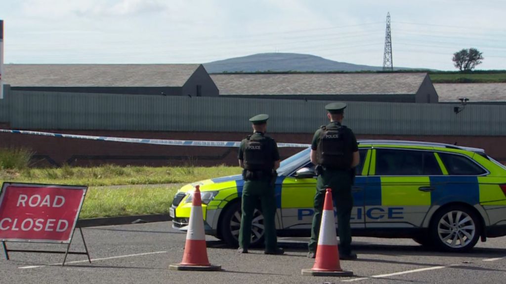 police officers at crash cordon on Maydown Road in Londonderry