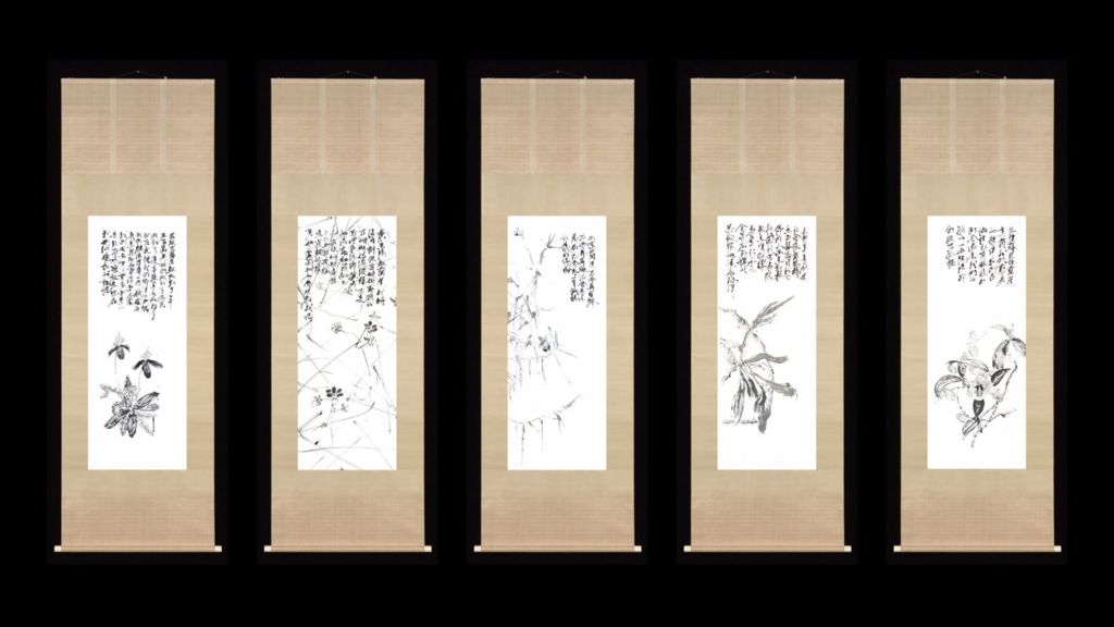 Five hanging scrolls show delicate ink orchids and flowing calligraphy. They are in front of a black background.