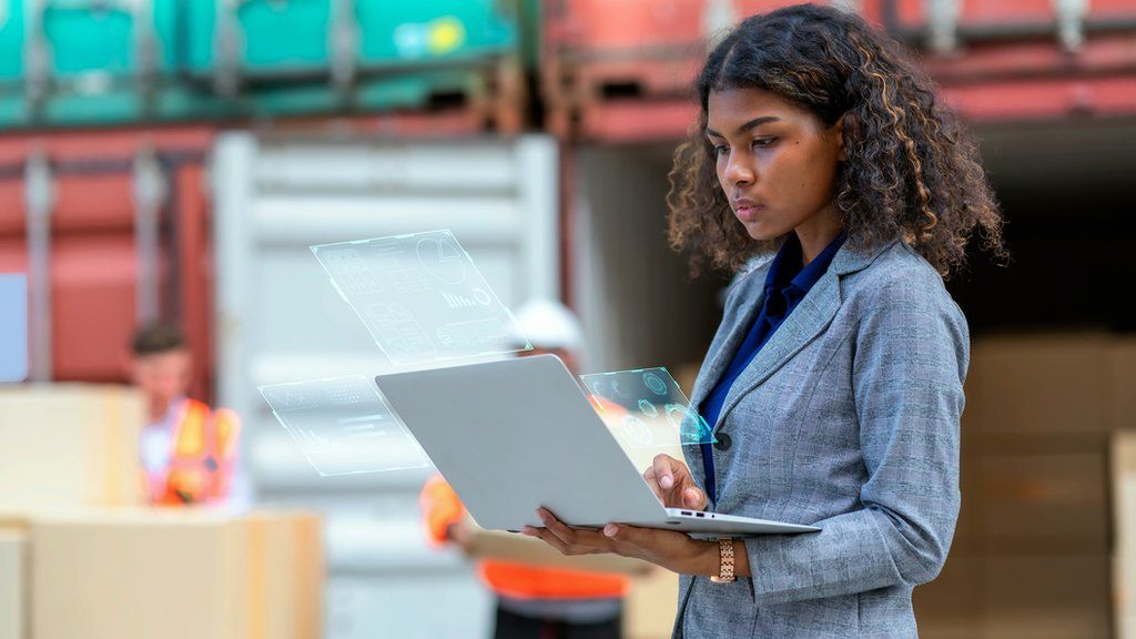 A stock photo of a woman with a laptop