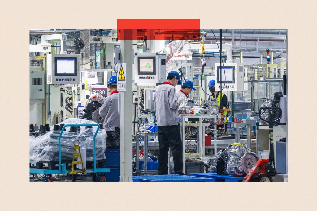 Employees work on the production line of 8-speed automatic transmissions at a factory in Wuhu, Anhui Province of China