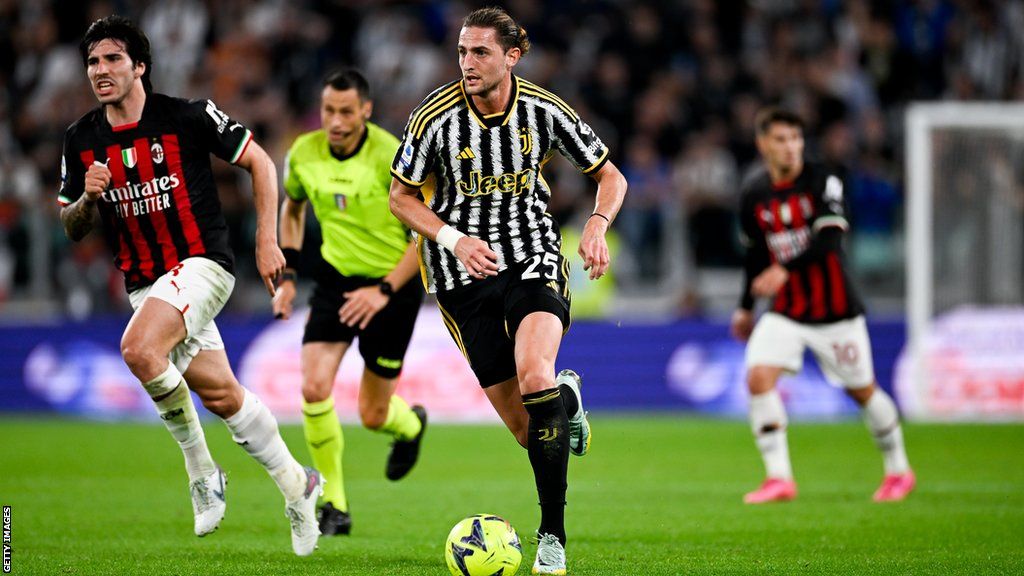 Juventus midfielder Adrien Rabiot dribbles with the ball