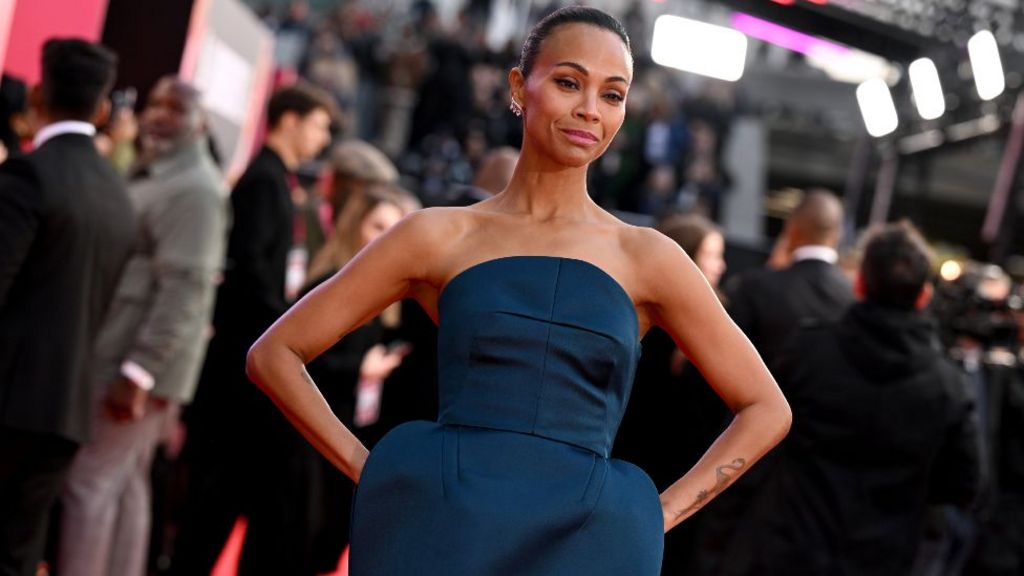 US actor Zoe Saldaña poses on the red carpet upon arrival to attend the Gala screening of "Emilia Perez" at the Royal Festival Hall, during the 2024 BFI London Film Festival in London, on October 11, 2024.