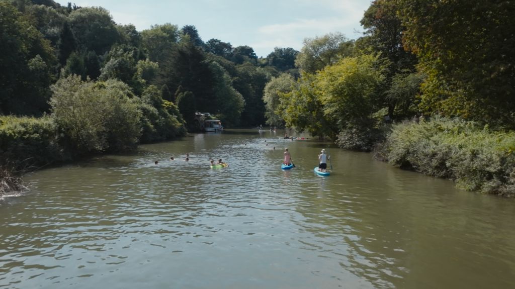 Still from Rave on the Avon of people swimming in the River Avon