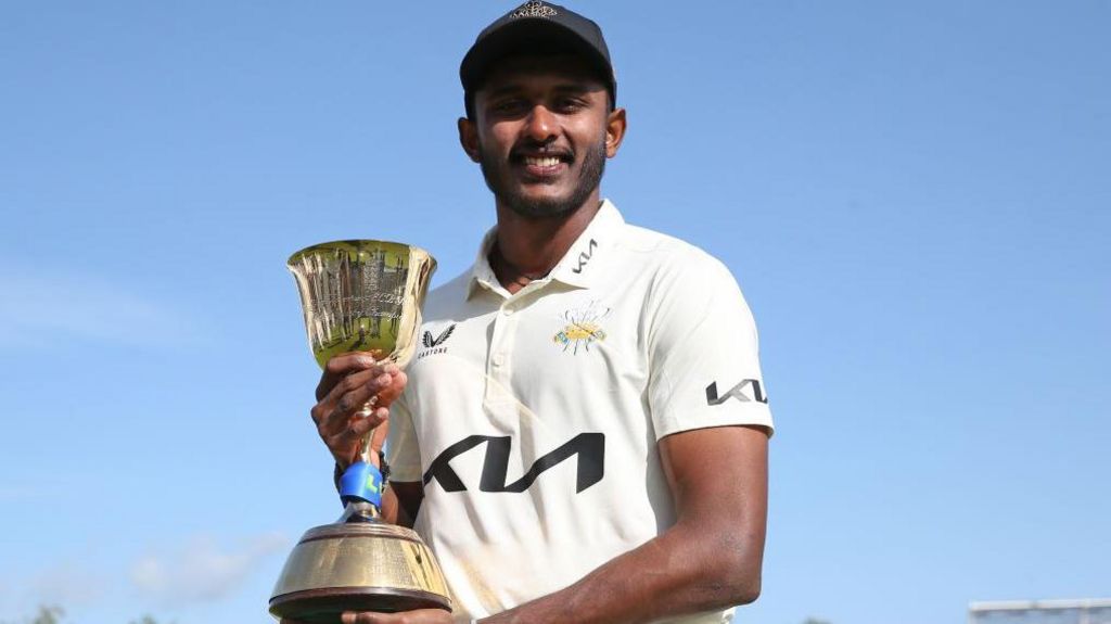 Sai Sudharsan poses with the County Championship Division One trophy