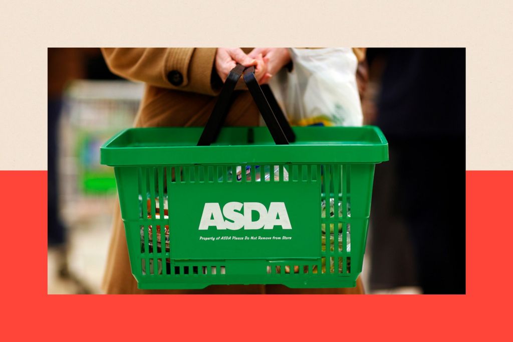 A shopper carries her purchases at an Asda store in Leyton, east London
