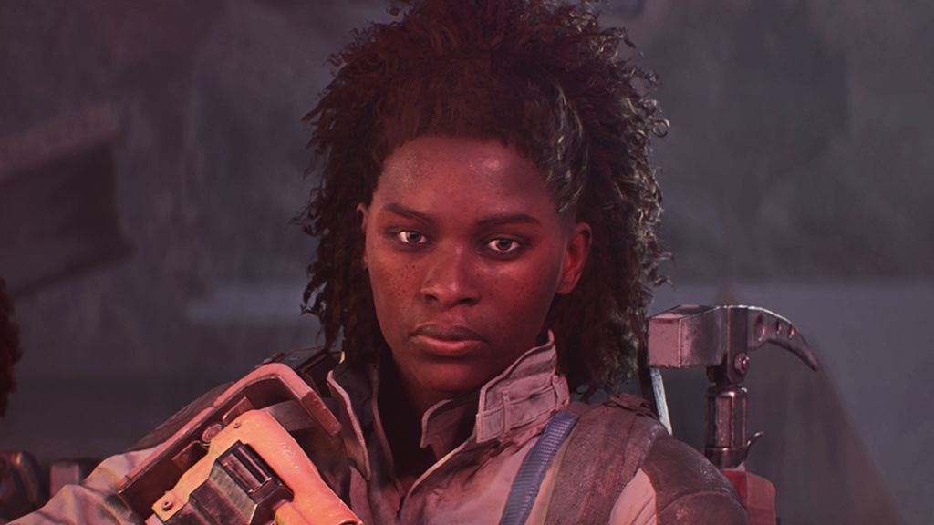 Screenshot from Arc Raiders shows a character holding a large rifle and with a hammer-like tool strapped to her back giving a determined look towards the camera.