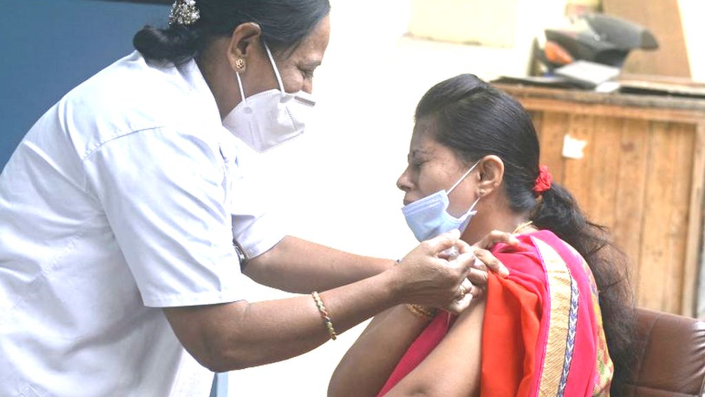 Woman gets a booster shot in Hyderabad, India