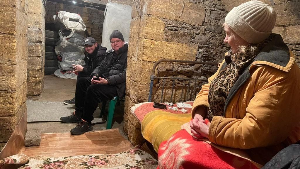 Family sheltering from Russian bombing