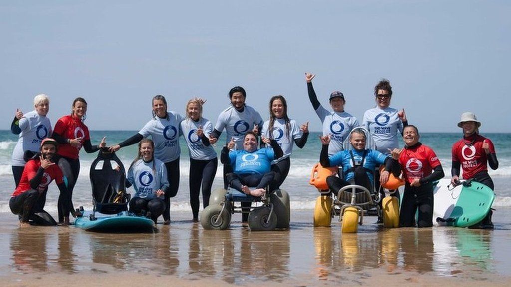 The Wave Project hosting an adaptive surf therapy session at Watergate Bay, Newquay