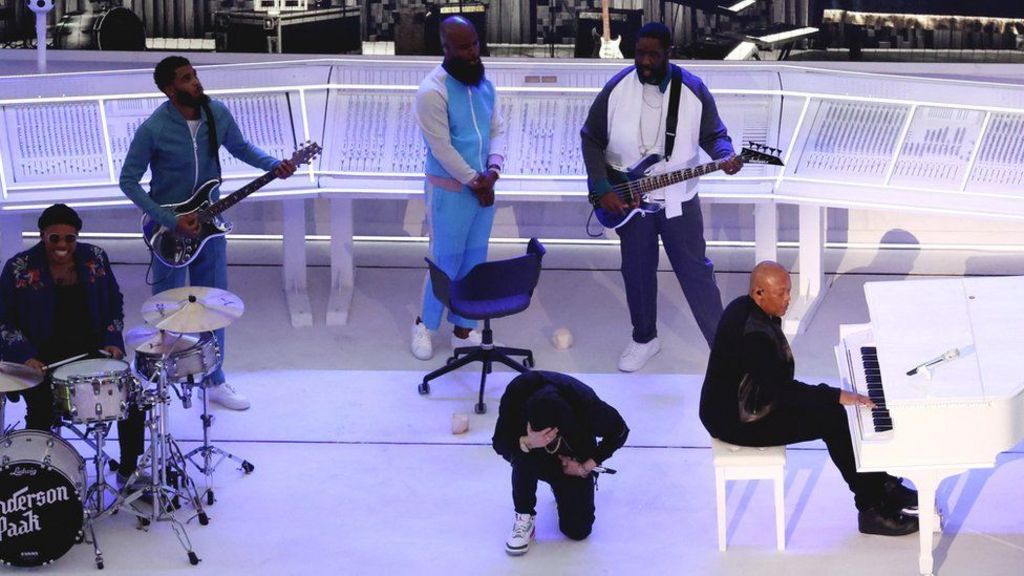 Eminem taking the knee against racism when performing in the hip-hop all-star lineup at 2022's Super Bowl