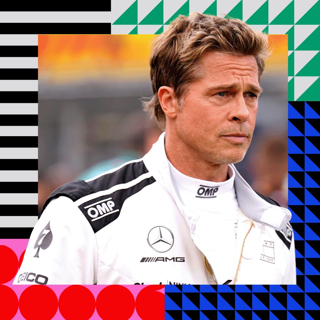 Brad Pitt is dressed in a racer's white jumpsuit covered in various brands and logos.