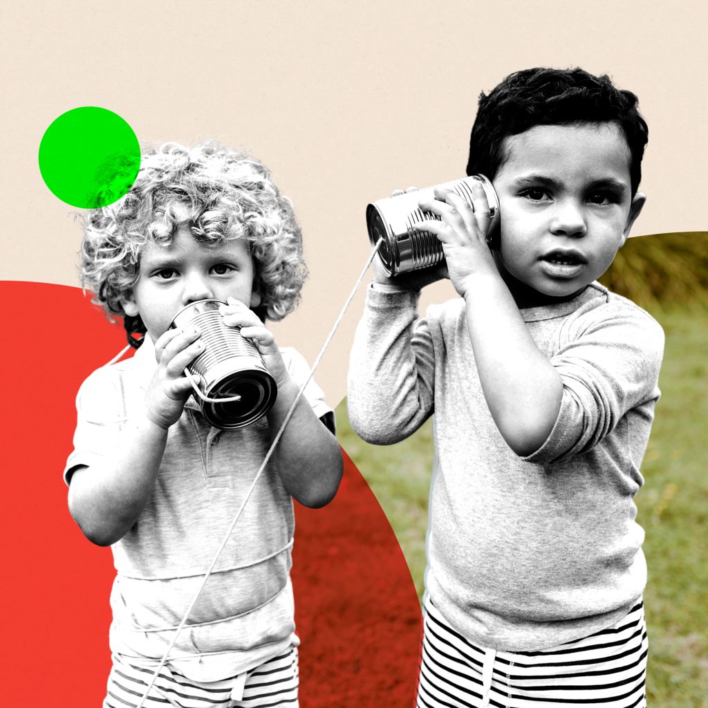 Two children talking into tin cans. The children have a grey filter and the background is green and red circles. 