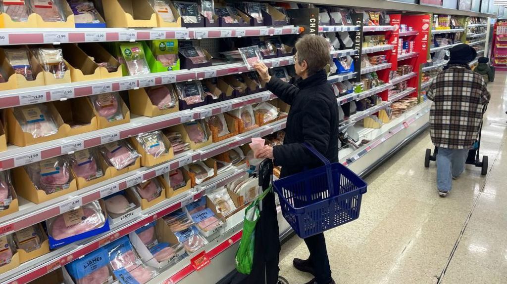 Woman shops for groceries