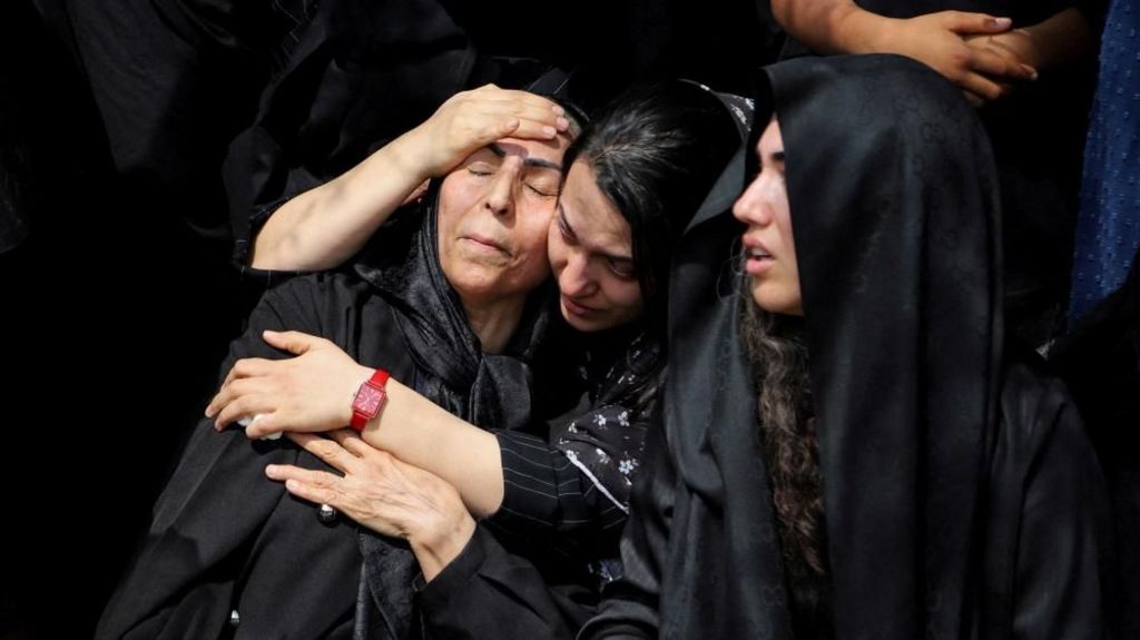 Women react during the funeral of the victims following a reported strike on a school, amid the U.S.-Israeli conflict with Iran, in Minab, Iran, March 3, 2026.
