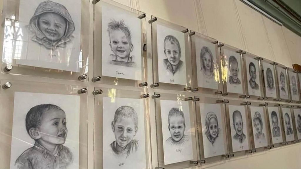 Photo of 'The Passing of Time: 40 Portraits', an exhibition depicting the images of Graeme and 39 other children affected by neuroblastoma, created by Joanne Humphreys