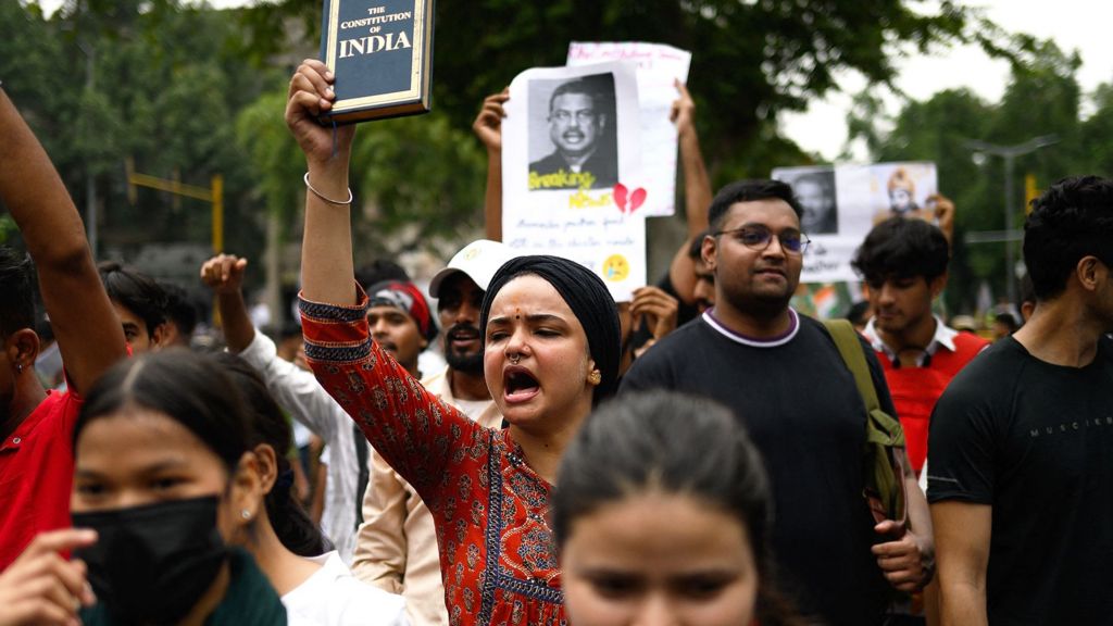 Activists and supporters of the Cockroach Janta Party (CJP) take part in a protest demanding the resignation of India's Education Minister Dharmendra Pradhan over alleged NEET examination irregularities in New Delhi on July 20, 2026