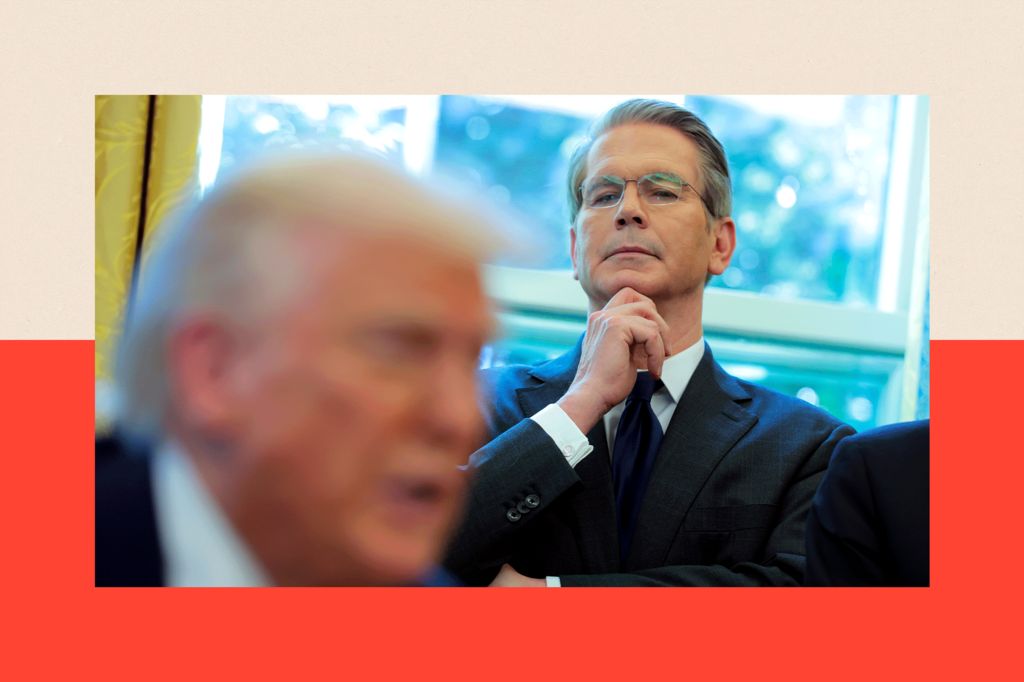 U.S. Treasury Secretary Scott Bessent looks on as U.S. President Donald Trump signs executive orders in the Oval Office of the White House