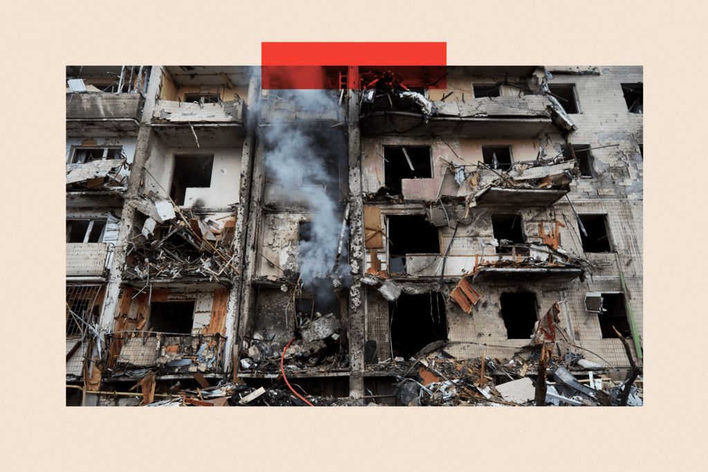 Smoke coming from inside a badly damaged residential building that was hit by a missile in Kyiv, Ukraine
