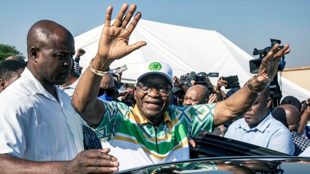 Former President Jacob Zuma greets supporters after voting at Ntolwane Primary School voting station on May 29, 2024