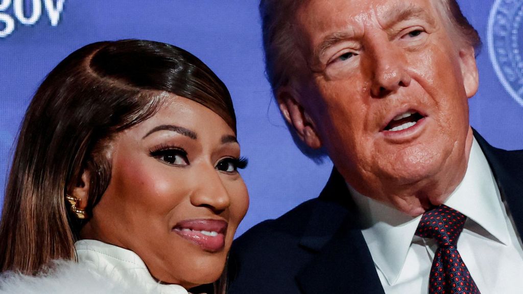 US President Donald Trump and musician Nicki Minaj stand together onstage at the US Treasury Department's Trump Accounts Summit, in Washington DC