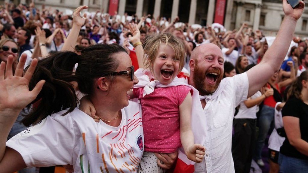Fans celebrate England's historic win