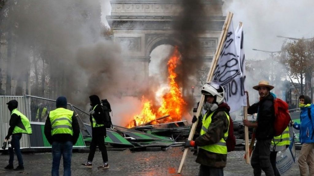 France Fuel Protests Police In Paris Fire Tear Gas Bbc News