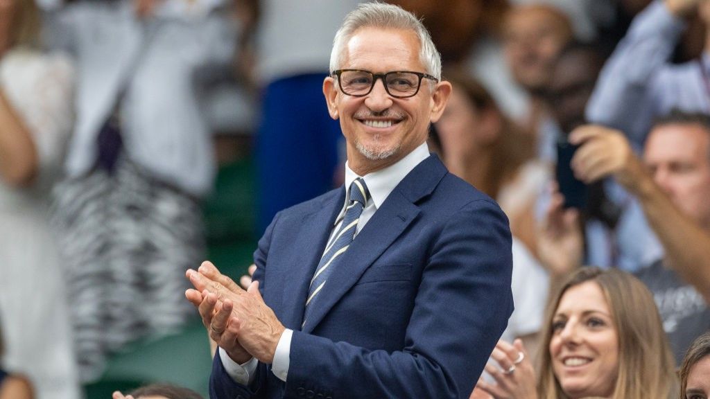 A smiling Gary Lineker in suit and tie