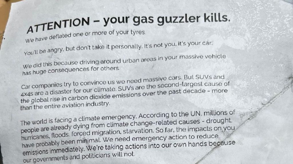 The activists left this leaflet on the windscreens of the vehicles they targeted