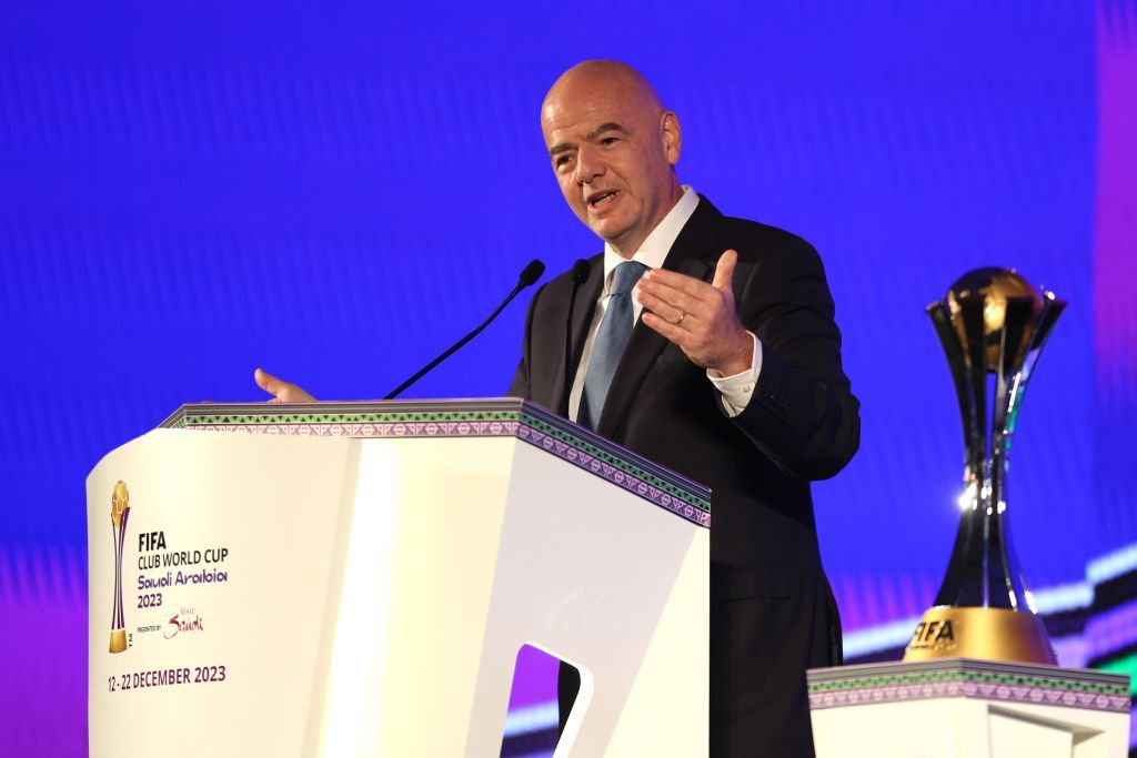 FIFA president Gianni Infantino stands astatine a lectern