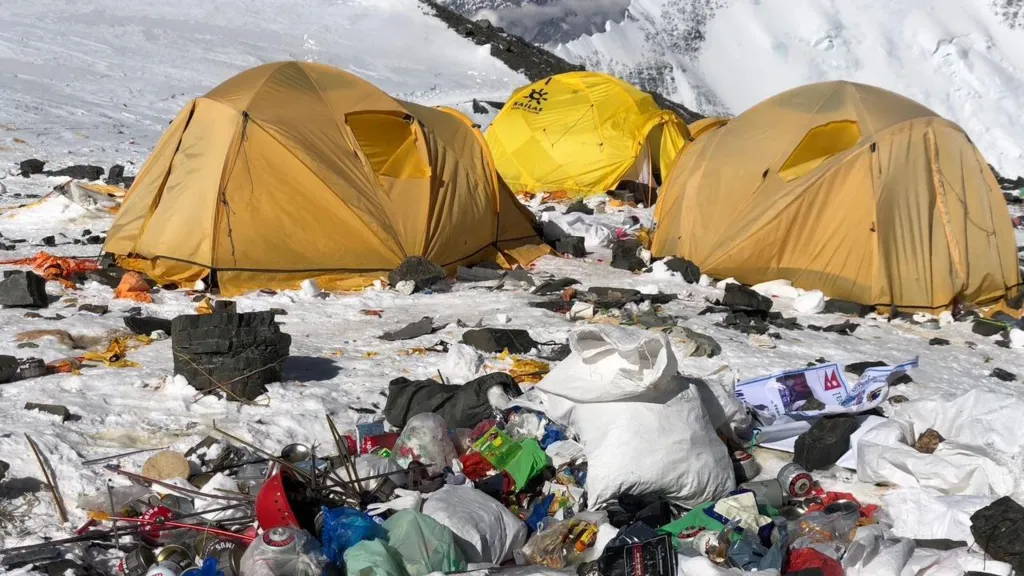 Camp IV on Everest with yellow tents and rubbish.