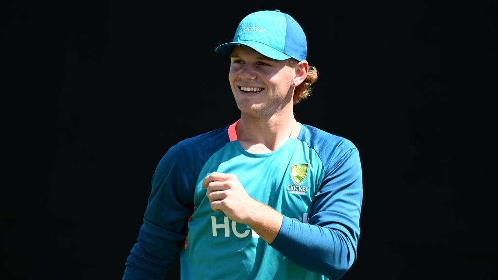 Jake Fraser-McGurk smiles during a training session