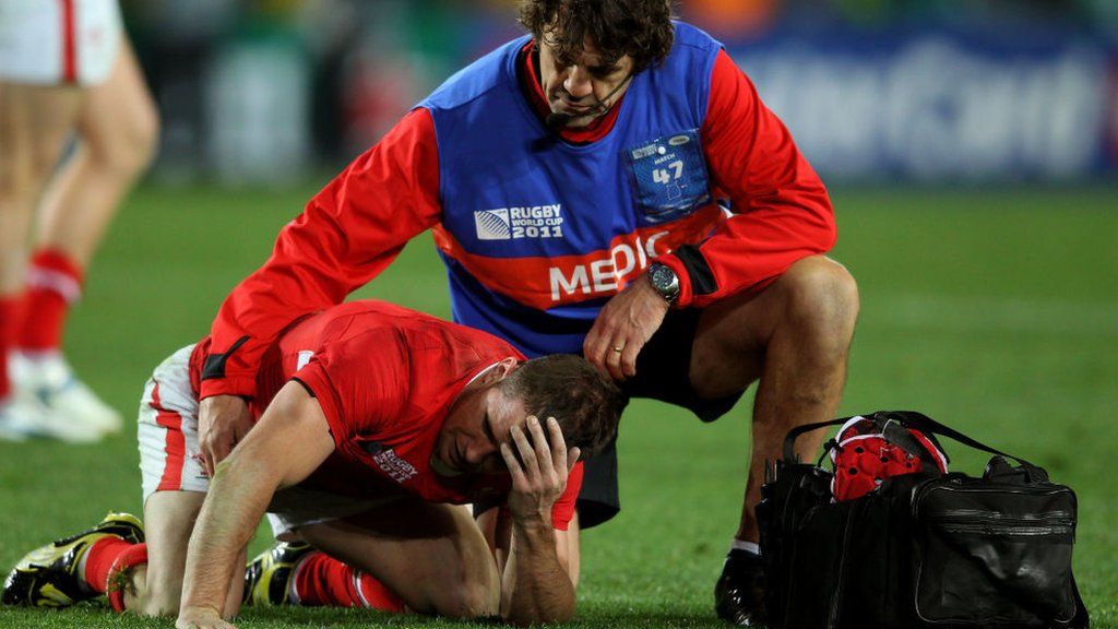 Shane Williams receives treatment for an injury