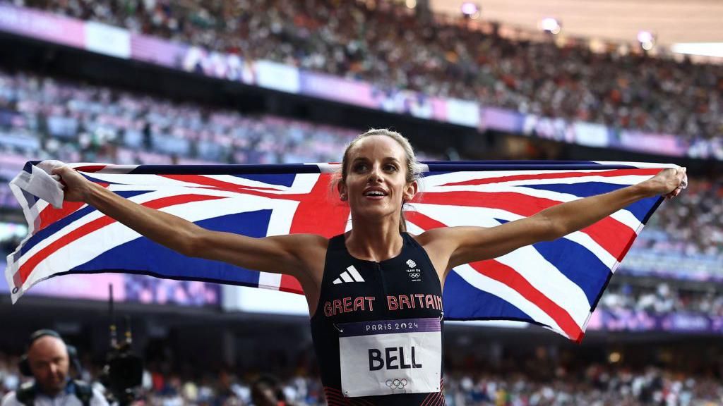 Georgia Bell celebrates with a Union Jack flag