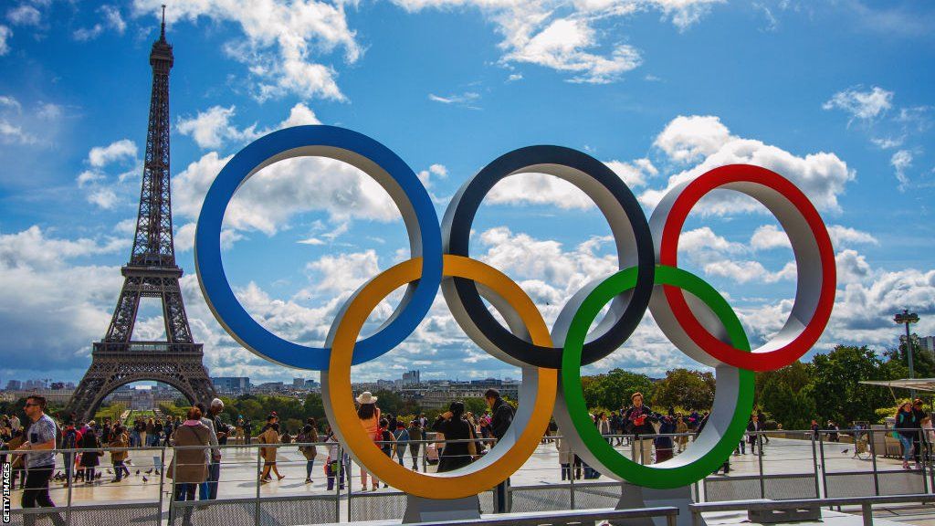 The Olympic Rings in front of the Eiffel Tower in Paris