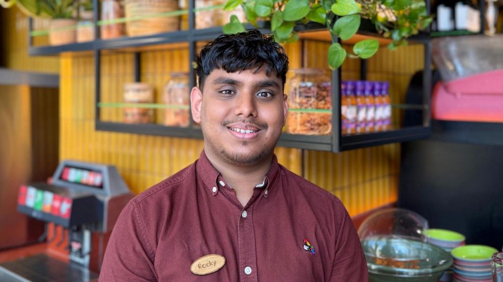 Rocky in his Nandos uniform