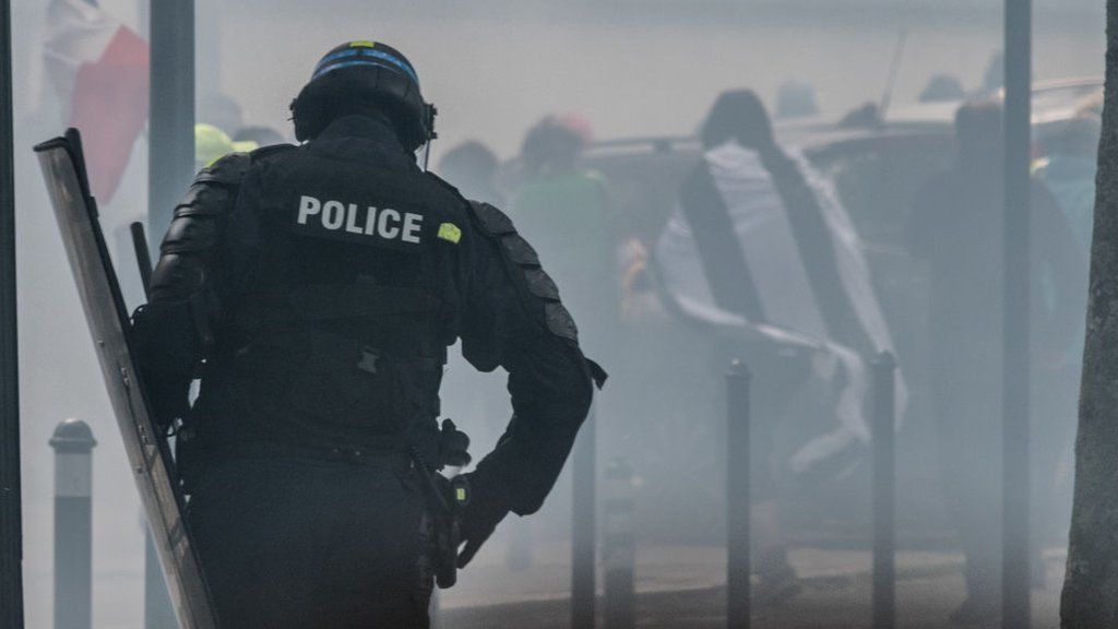 A policeman is pictured during a demonstration called by the yellow vest (gilets jaunes) movement in Nantes in May 2019