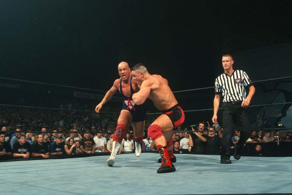  John Cena in action against Kurt Angle during SmackDown at Allstate Arena on June 25, 2002 in Rosemont, Illinois. 