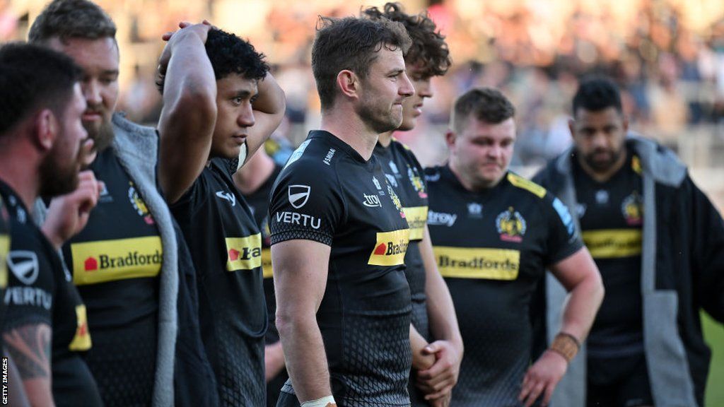 Exeter Chiefs players look on after losing to Bath