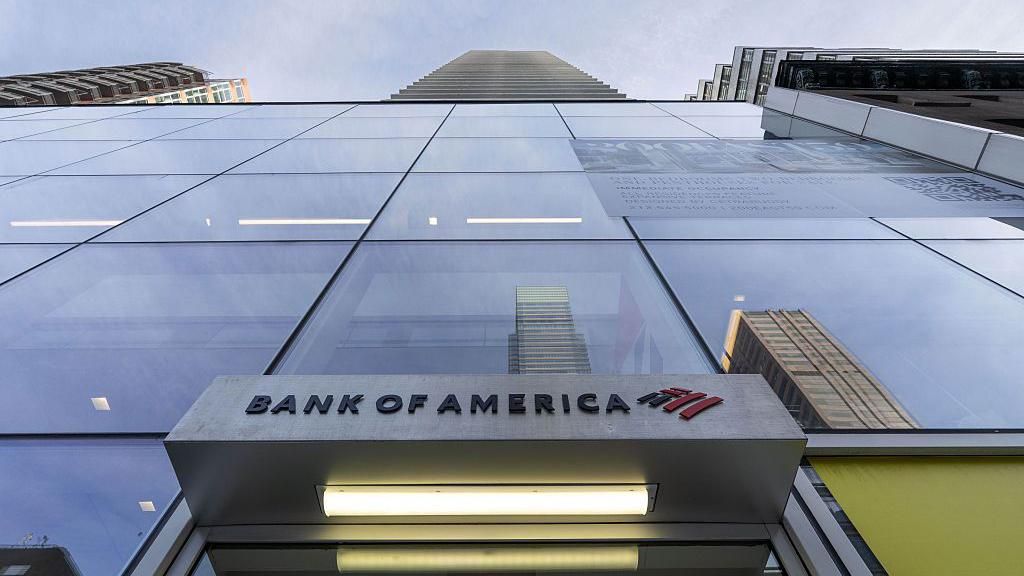 A shot looking up to the top of a skyscraper, which has a Bank of America branch and logo at the bottom at 200 East 59th street in New York, US, on Friday, Jan. 23, 2026.
