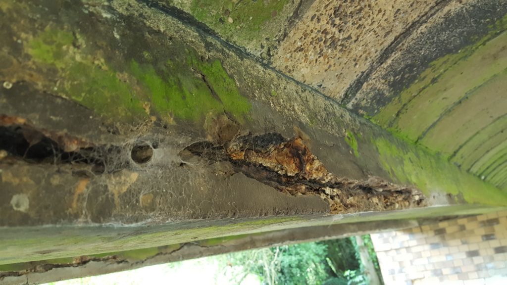 Corrosion to a beam inside the bridge