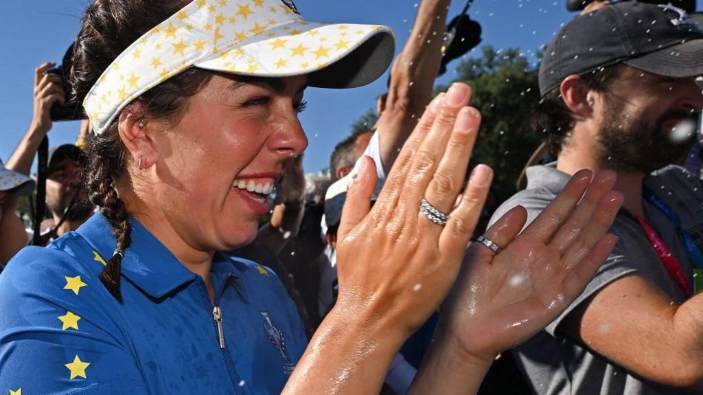 Georgia Hall celebrates after Europe retained the Solheim Cup in Spain in 2023