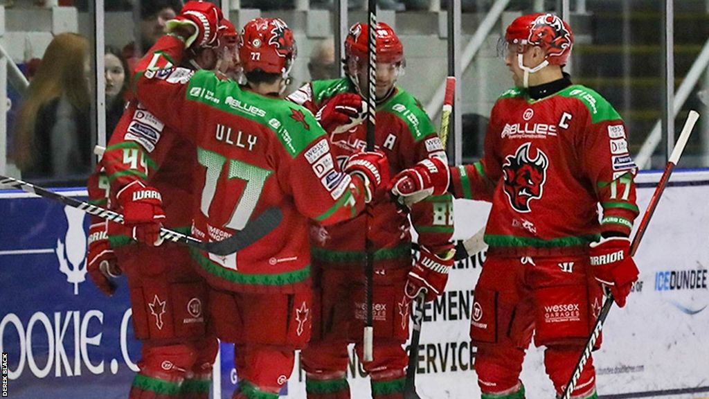 Cardiff Devils celebrate their fourth goal against Dundee Stars