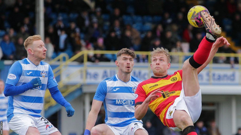Partick Thistle Harry Milne (right) attempts an overhead kick at Cappielow
