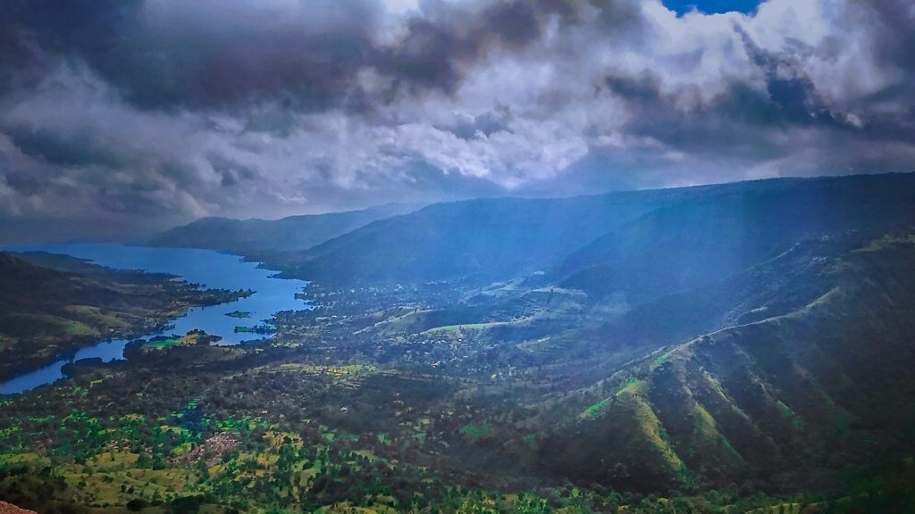 Western ghat of India: Mahabaleshwar hill station with river, monsoon clouds and forest.