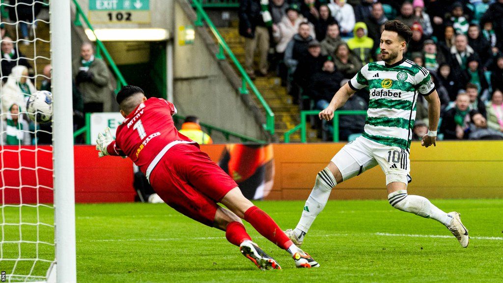 Nicolas Kuhn scores for Celtic against St Johnstone