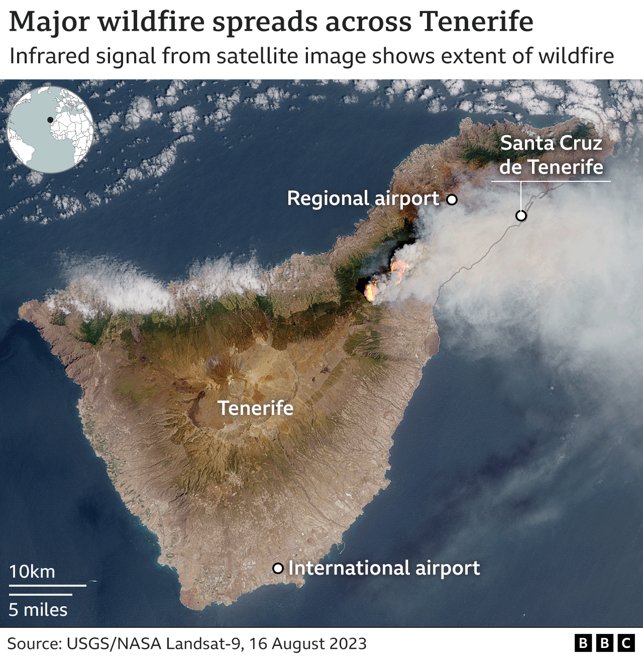 Satellite image of Tenerife showing smoke from the wildfires south of Santa Cruz and in the east of the island.